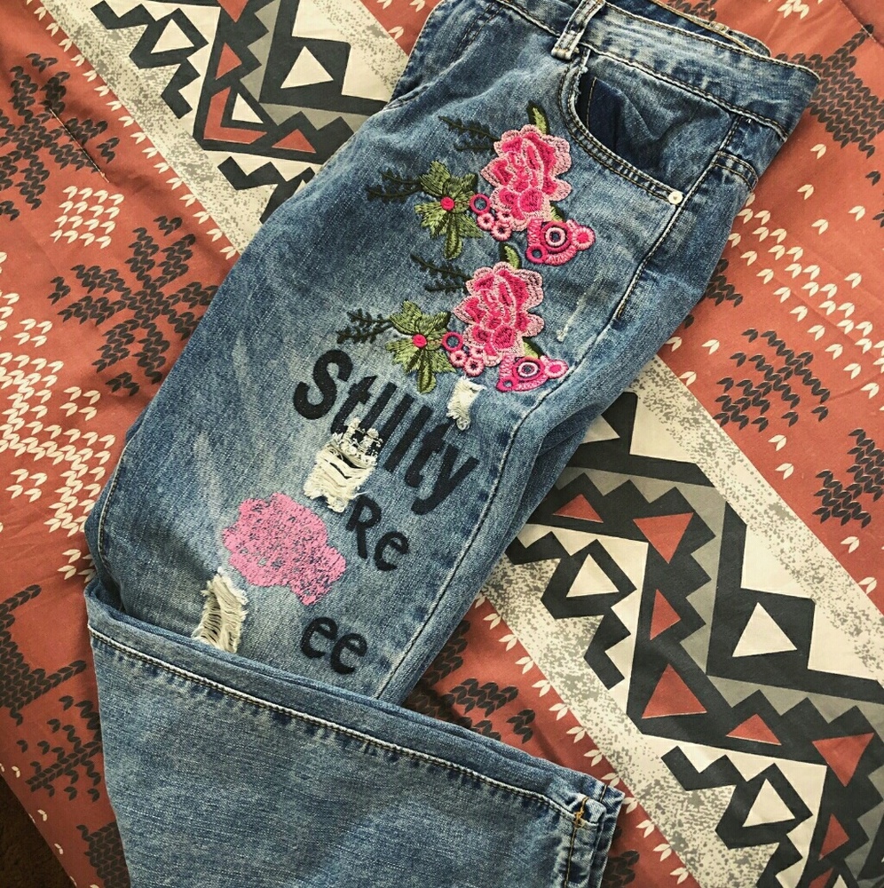 Embroidered and printed jeans